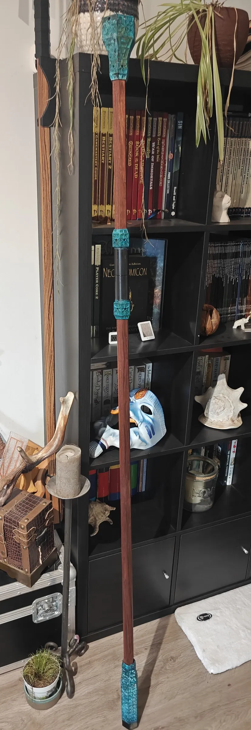 A complete staff with green-blue corroded copper on the topper, grip and foot