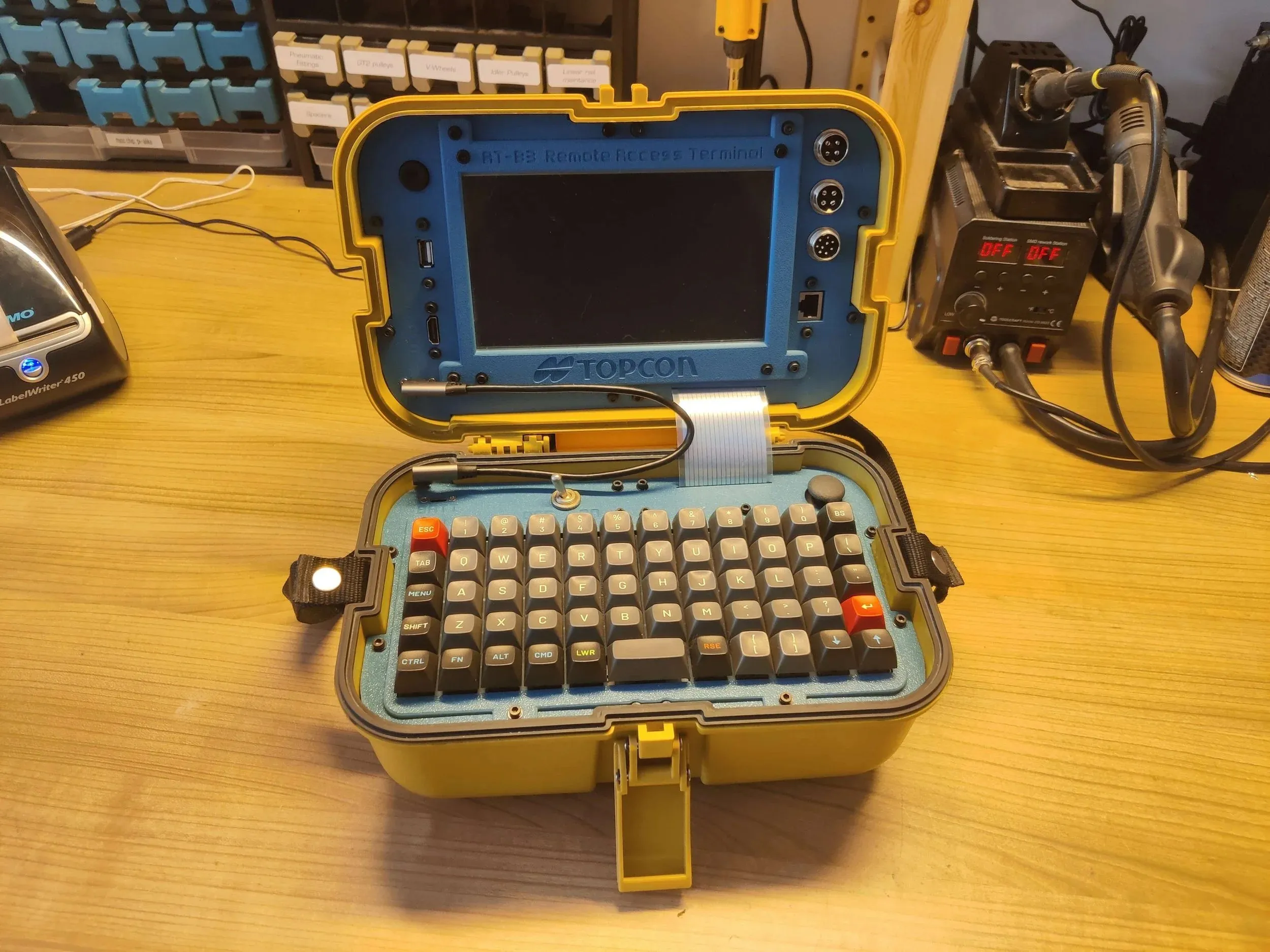 The cyberdeck open with the screen off