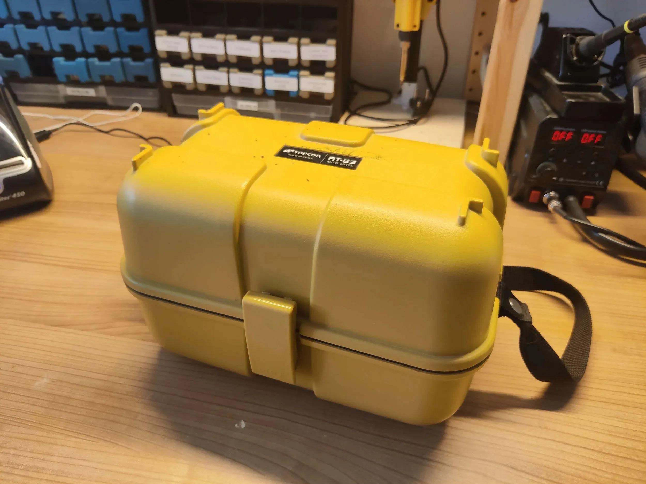 The cyberdeck closed, looking like an ordinary yellow equipment case